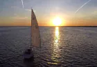Sailboat sailing during sunset