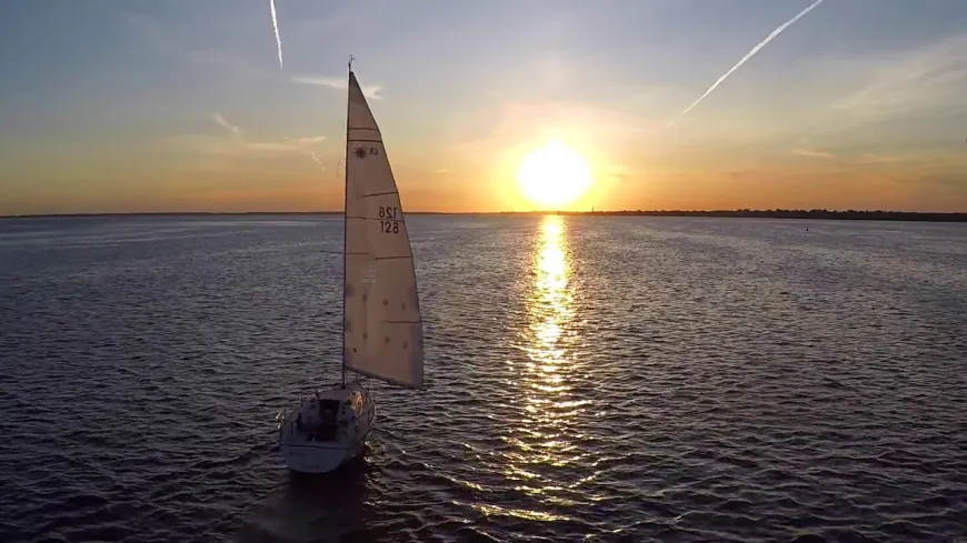 Sailboat sailing during sunset